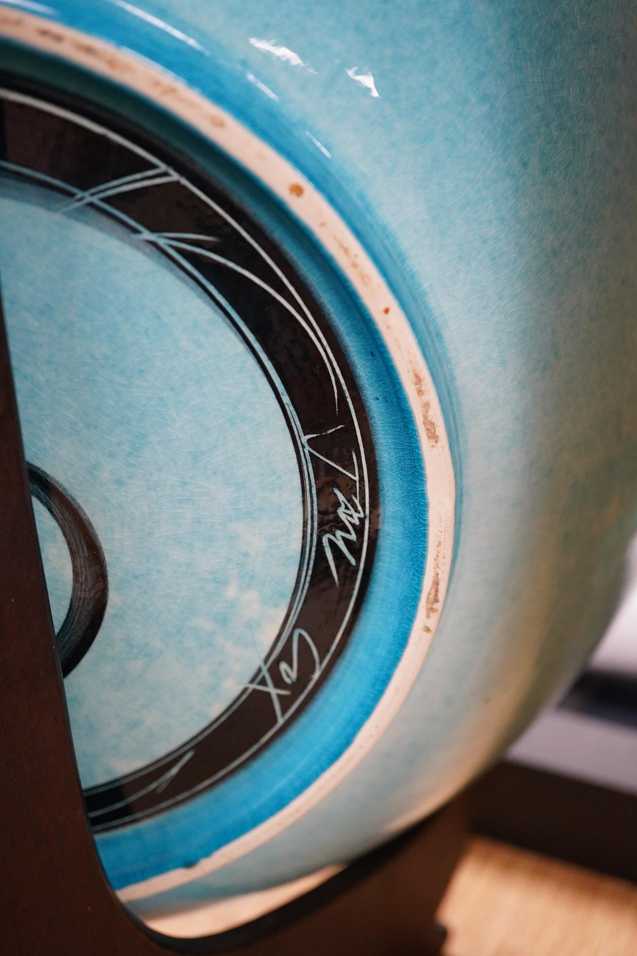 Jane Cox, (b.1962) 'Aquitaine' turquoise pottery dish, incised mark, 36cm in diameter